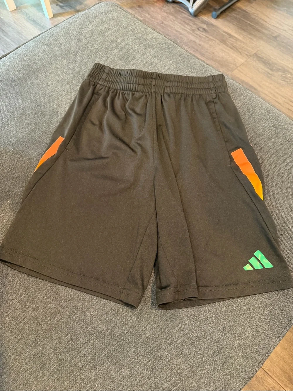 Adidas Black Athletic Shorts with Orange, Yellow, and Green Accents